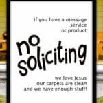 Printable No Soliciting Sign in front of a house.