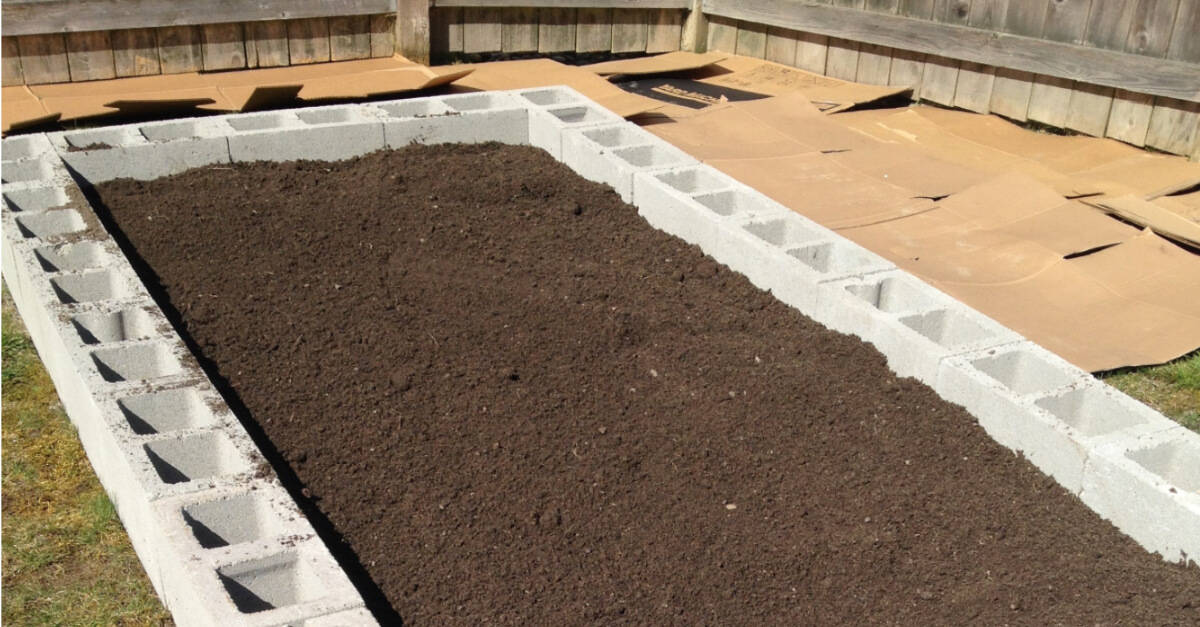 How to Build a Cinder Block Raised Garden Bed - Sunshine and Rainy Days