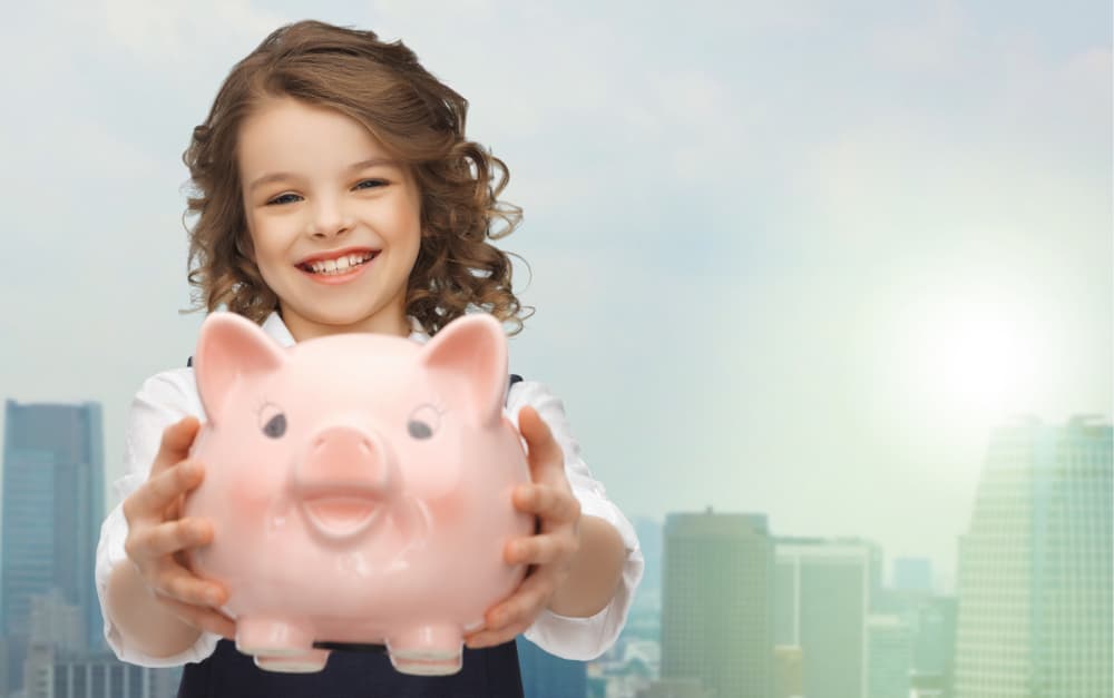 Girl and Piggy Bank