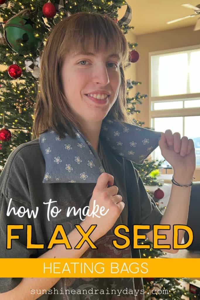 Justine standing in front of our Christmas Tree with a Flax Seed Heating Bag around her neck!