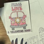 Image of printable Valentine's Day cards that you can color next to colorful markers.