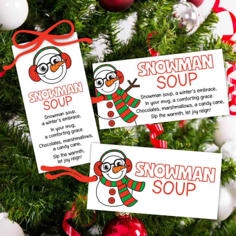 Image of three printable Snowman Soup Tags with a Christmas tree in the background.