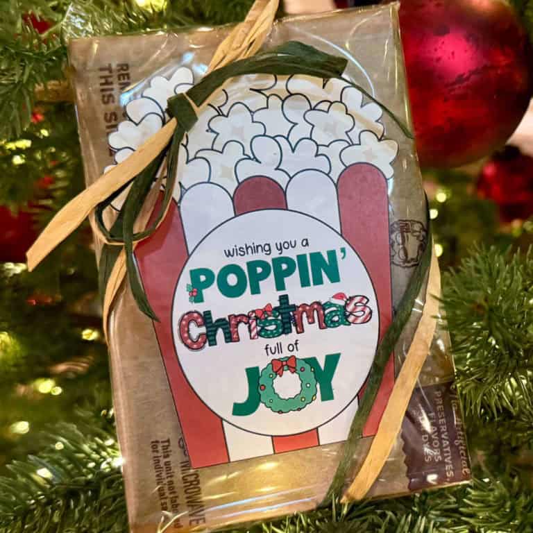 Tag on a bag of microwave popcorn that says Wishing You A Poppin' Christmas Full Of Joy.