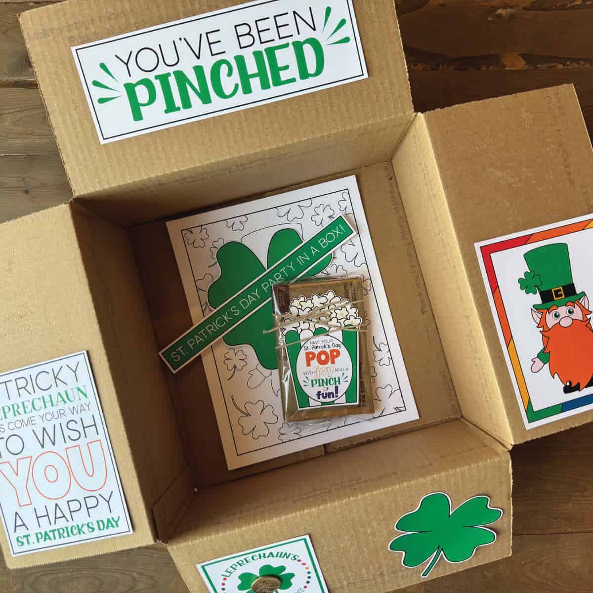 A box that has been decorated for St. Patrick's Day to send to a college student or family member.