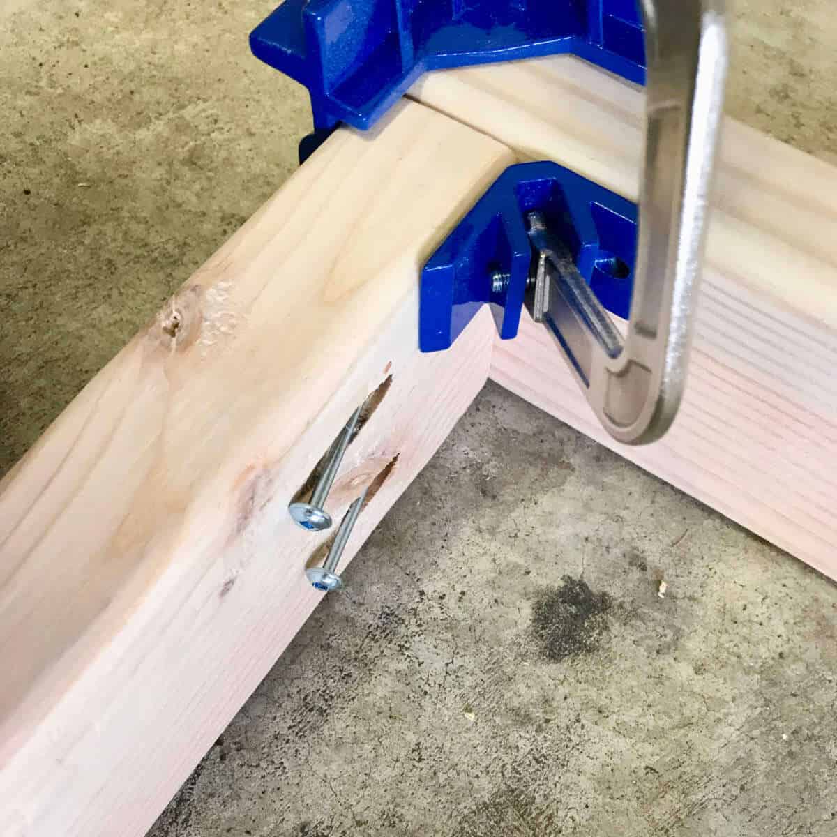 Corner clamp on two pieces of 2 x 4 so they can be joined.
