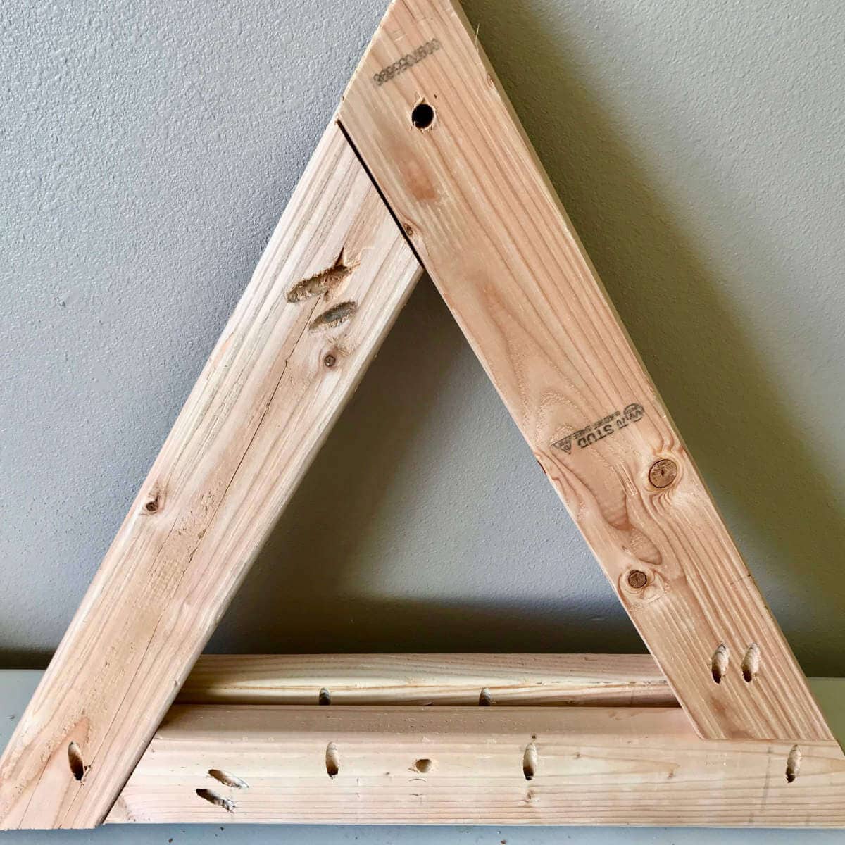 Triangle leg built out of 2 x 4s and pocket holes.