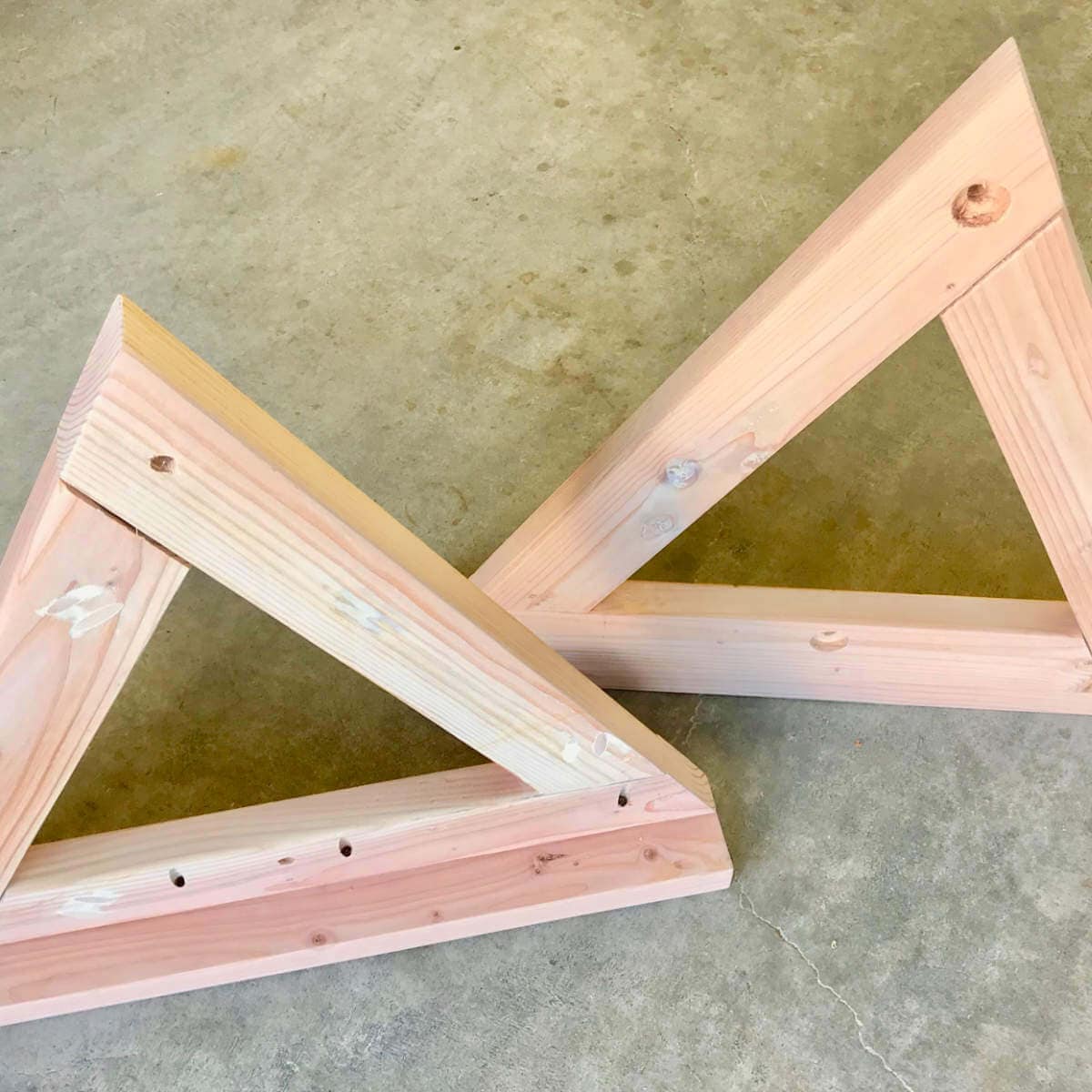 Triangle wood legs build out of 2 x 4s and pocket holes.