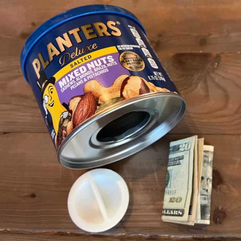 Peanuts safe with the closure sitting next to it and folded money.