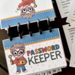 Image of a discbound password keeper featuring a clipart little guy holding a lock and key.