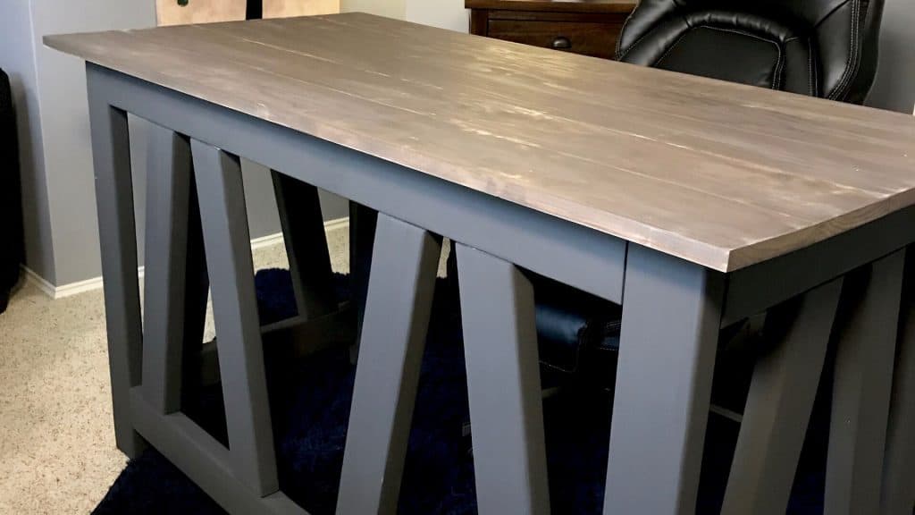 Desk with stained top and chalked paint base, in charcoal.