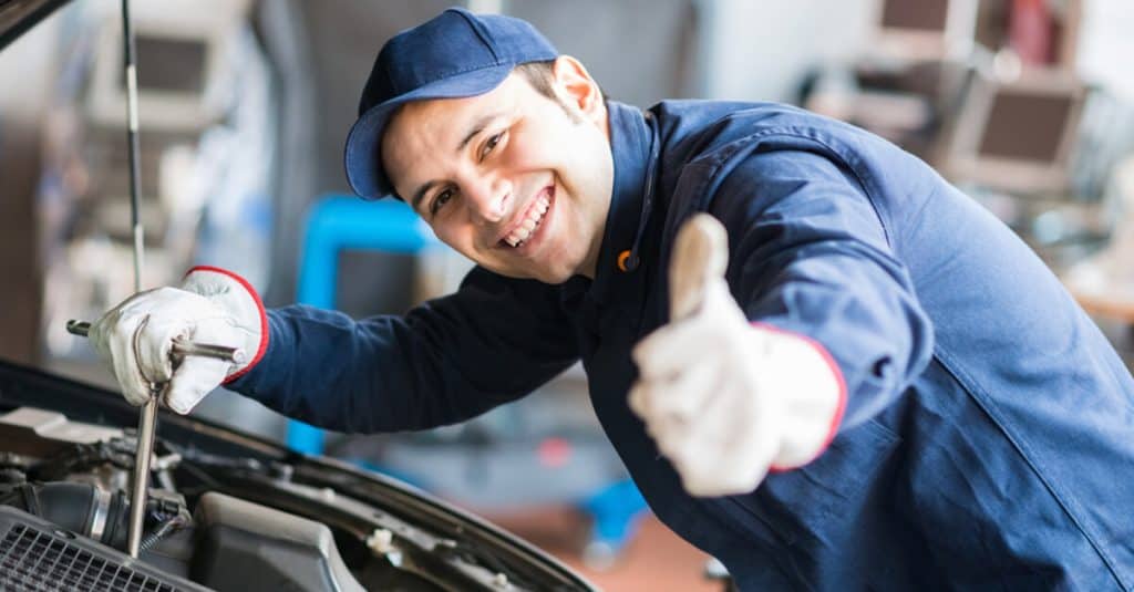 Mechanic giving a thumbs up.