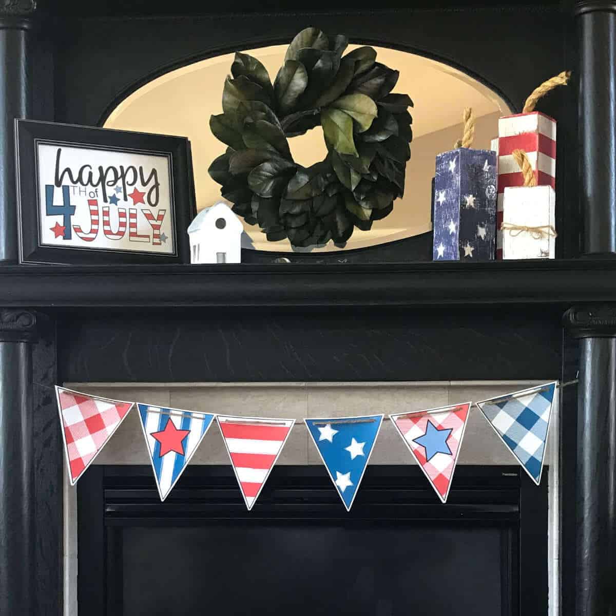 Printable 4th of July Banner hung on a fireplace mantel with a 4th of July Sign and 4 x 4 firecrackers.