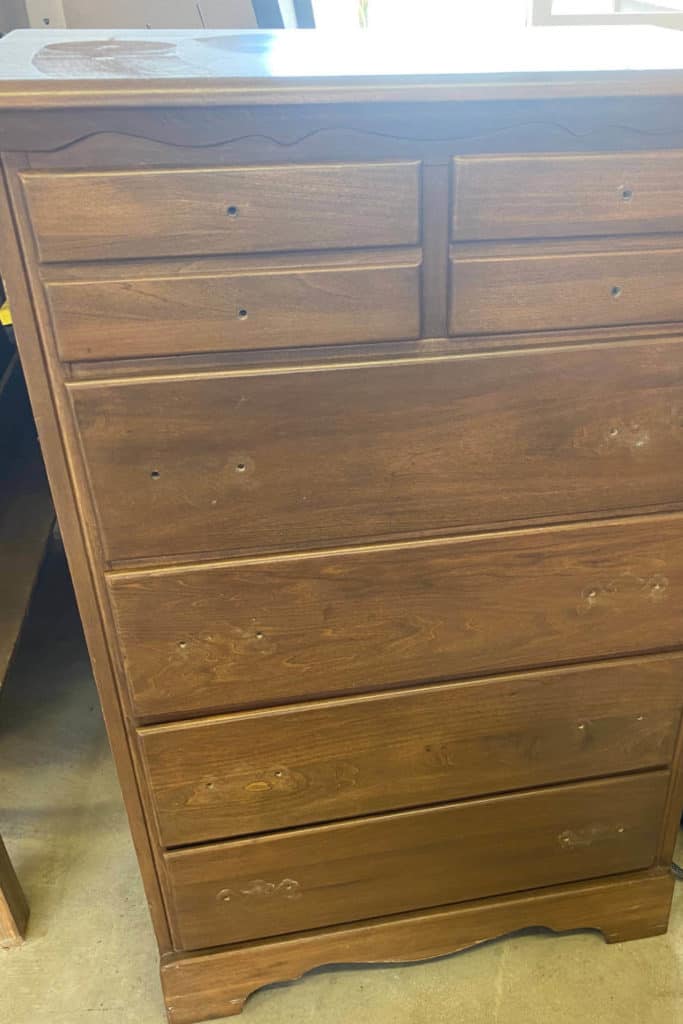 Chest of drawers, with hardware removed, ready to be refinished.