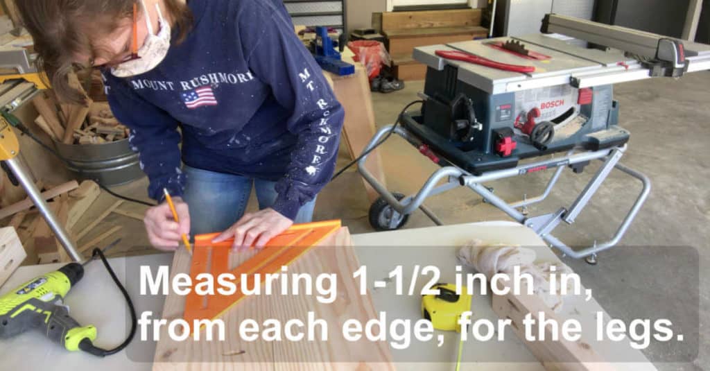 Measuring in 1-1/2 inch from each edge to find the placement for bench legs.