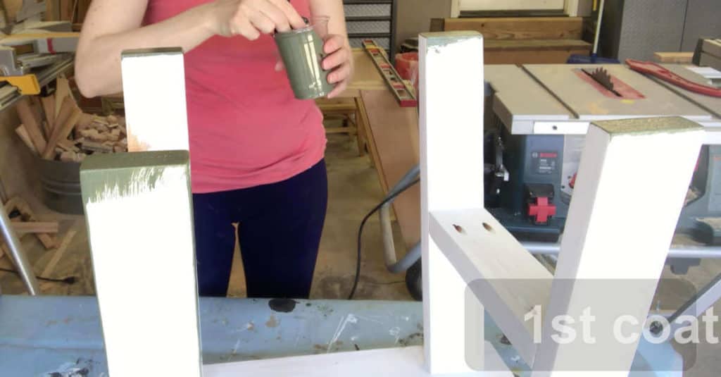 Painting the first coat on the small bench.