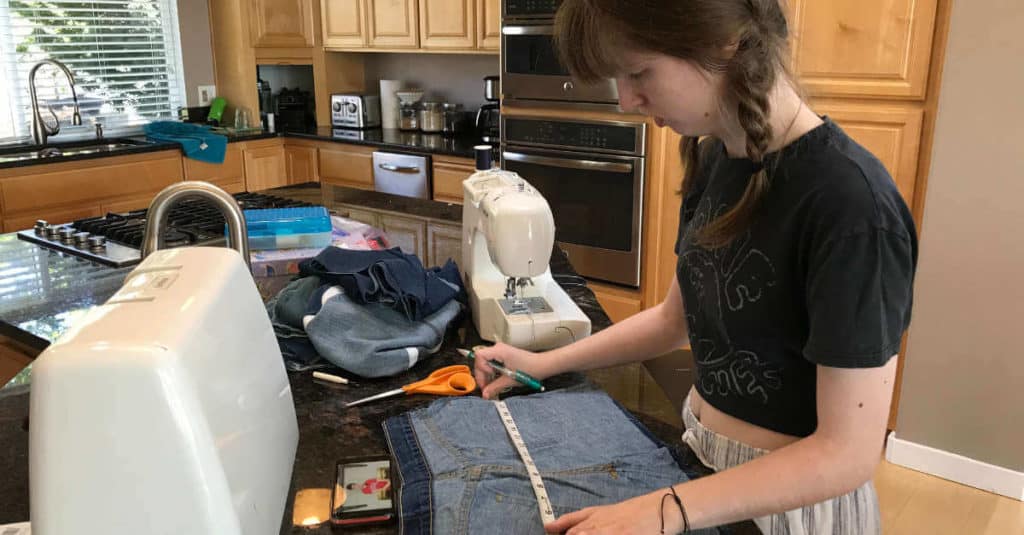 Making a jean skirt out of an old pair of jeans.
