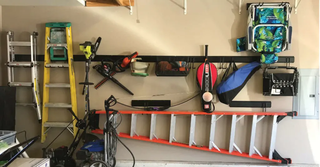 Using vertical wall space to organize the garage.