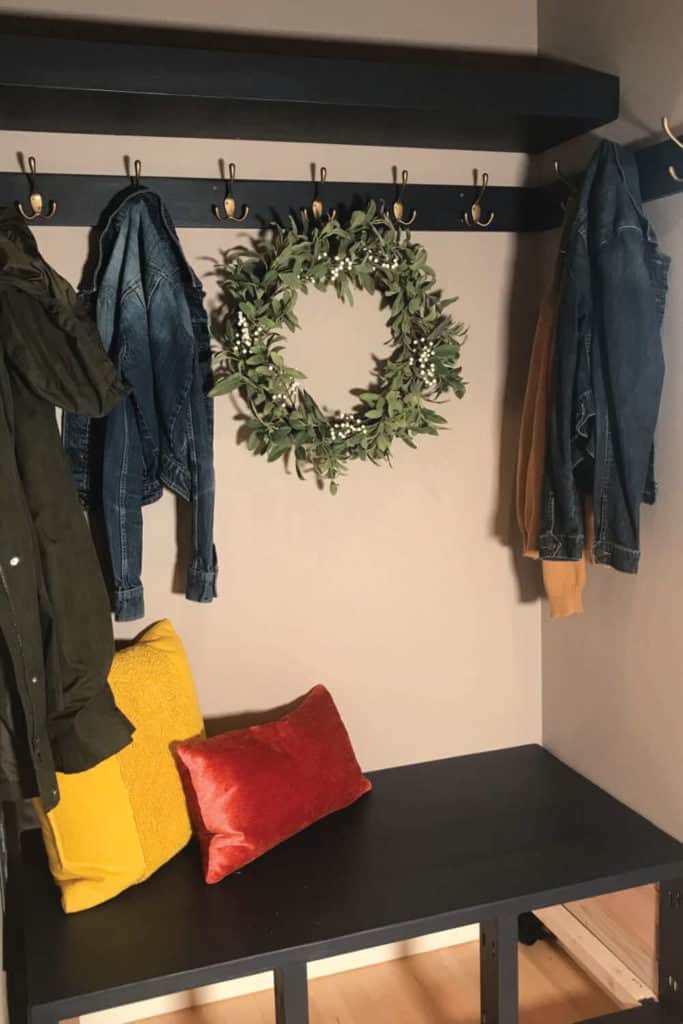 Coat closet converted into a mudroom nook.