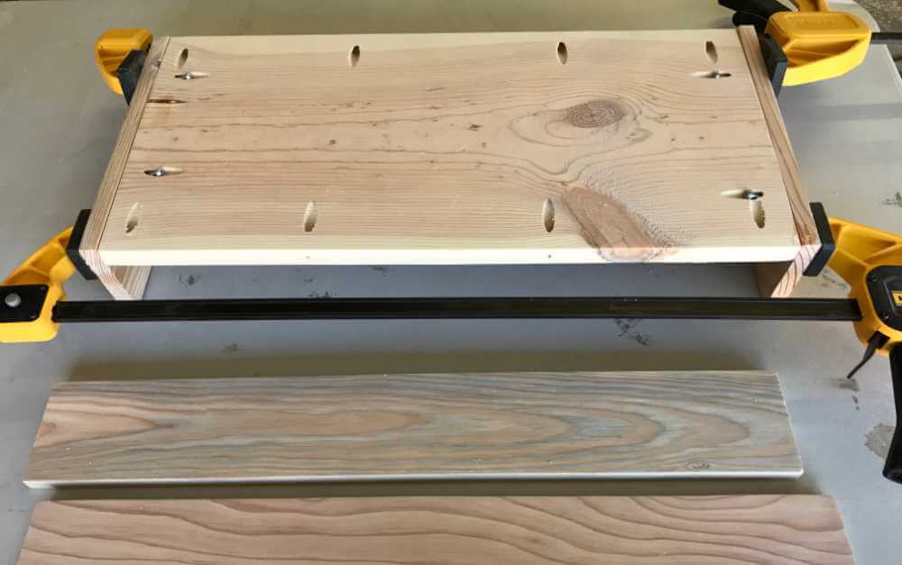 Attaching end pieces to a wood tray, using pocket holes.