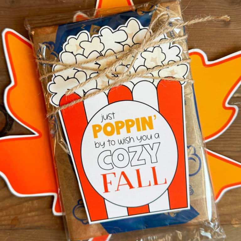 Printable fall popcorn tag on a bag of microwave popcorn and tied on with jute.