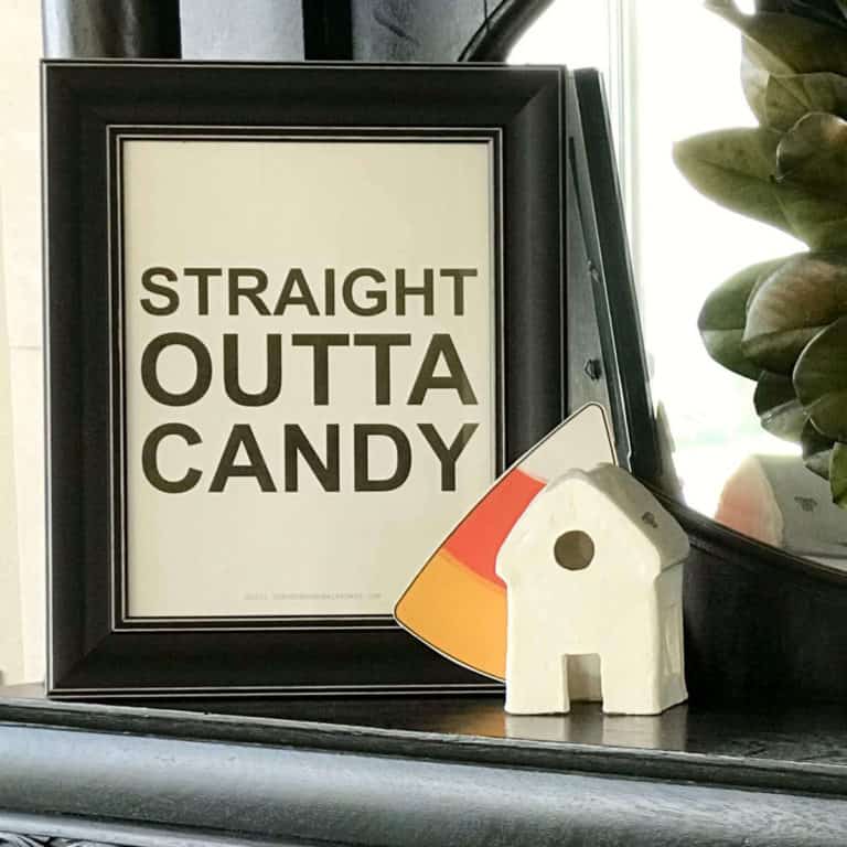 Straight Outta Candy printable sign on a fireplace mantel.