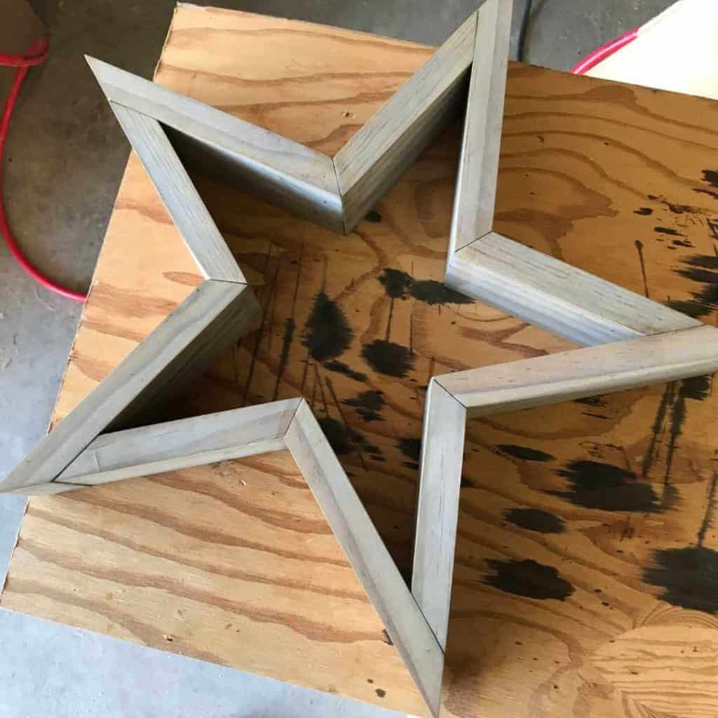 Wooden star with one coat of tea stain and two coats of vinegar stain.
