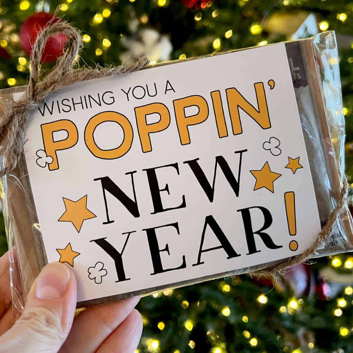 Wishing You A Poppin' New Year tag on a bag of microwave popcorn.