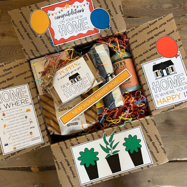 Image of a box with printable box flap decorations in a new home theme.