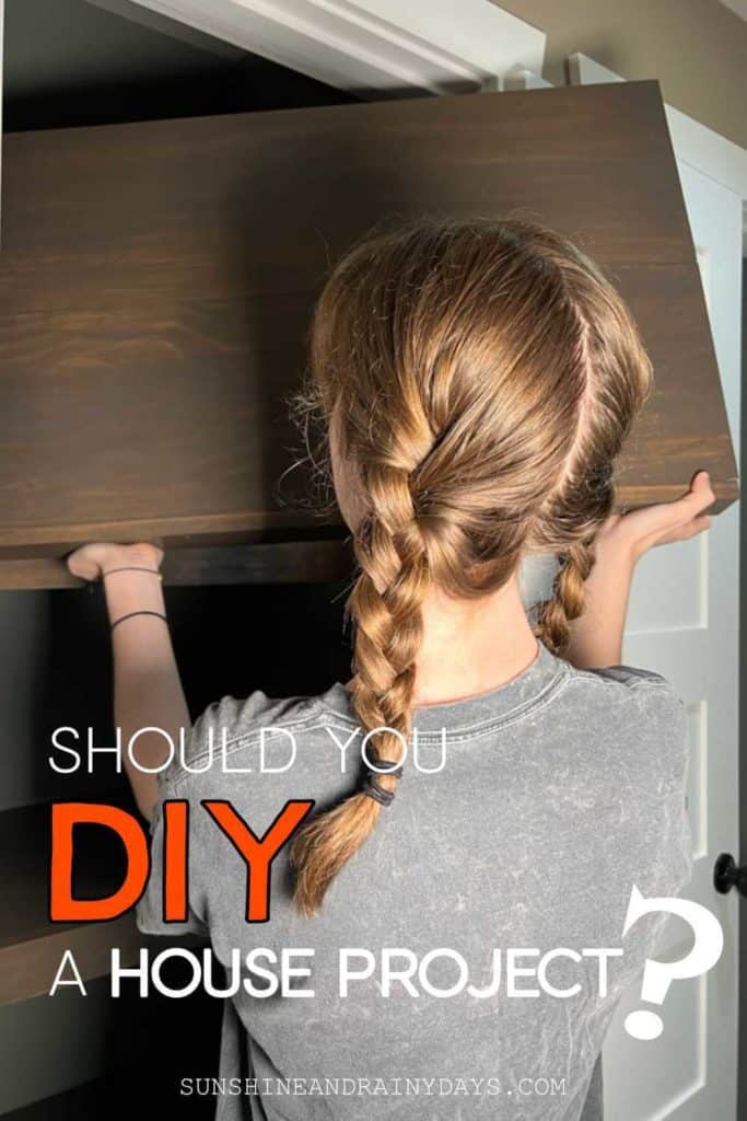 Justine installing DIY shelves in a linen closet.