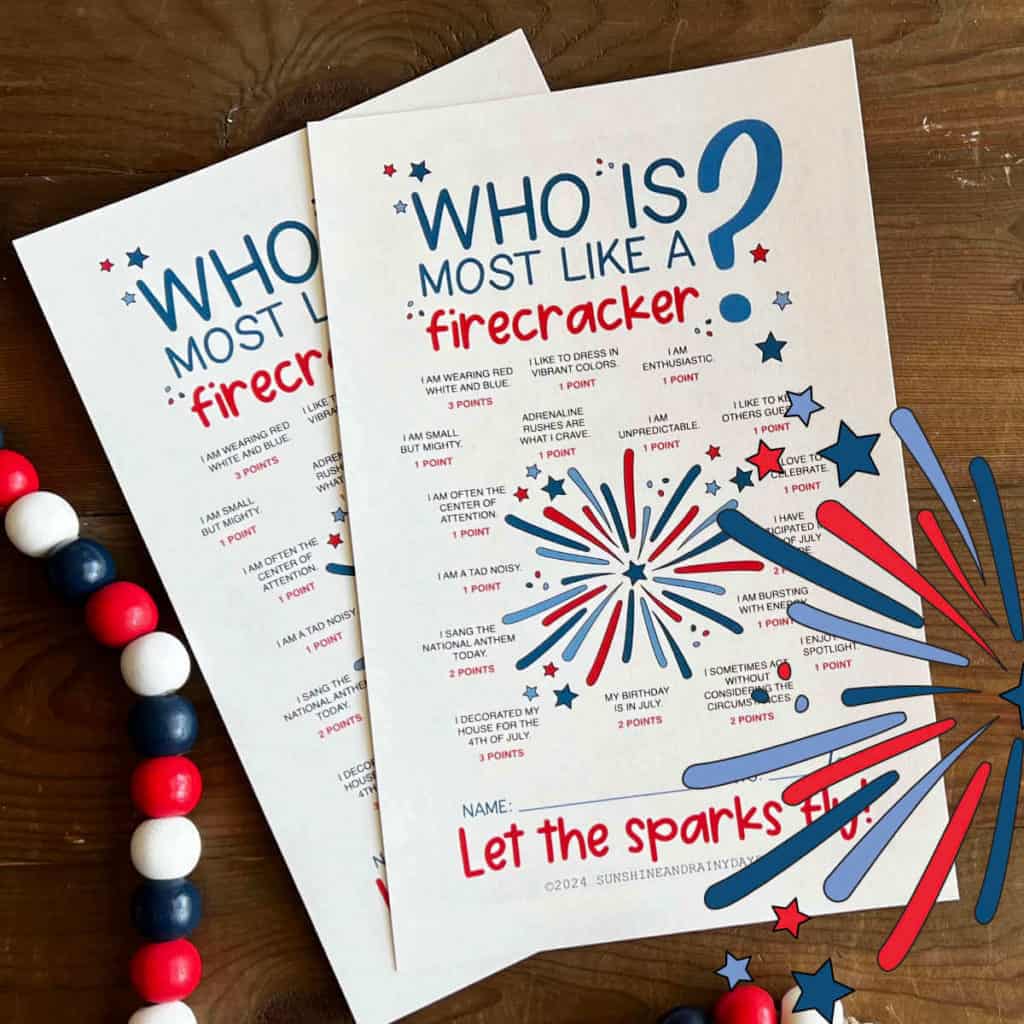 Two copies of the Who Is Most Like A Firecracker Game with a red, white, and blue beaded garland next to it and a clip art fireworks on top.