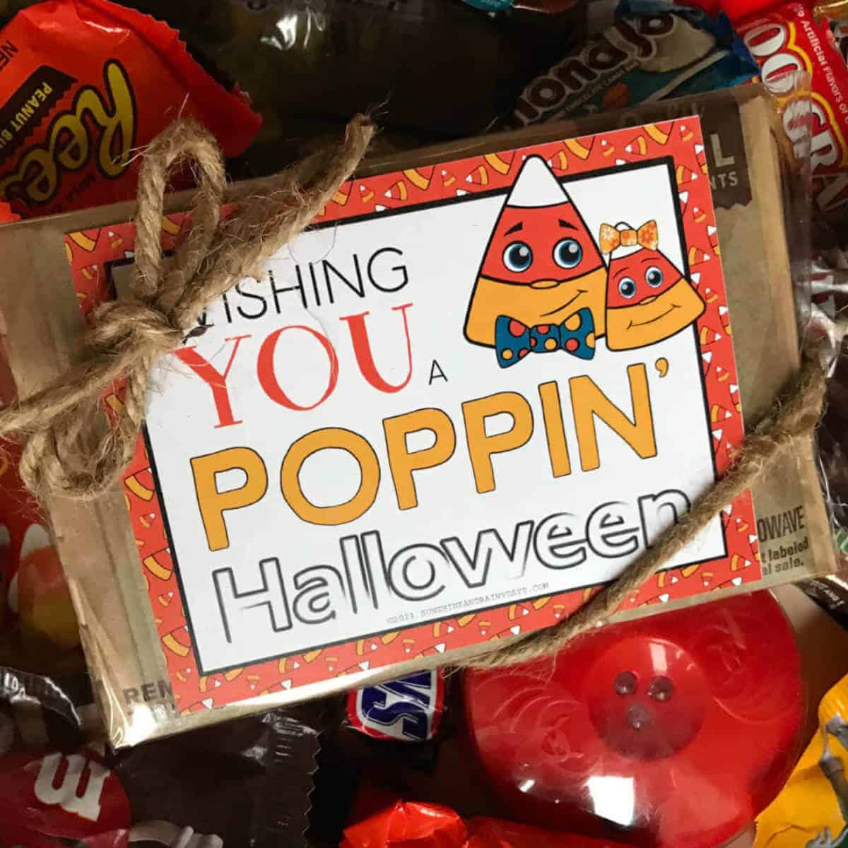 Image of a tag on microwave popcorn that says Wishing You A Poppin Halloween.