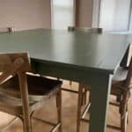 Kitchen table that has been painted with Fusion Mineral Paint in the color Bayberry and the top finished with a water-based polyurethane.