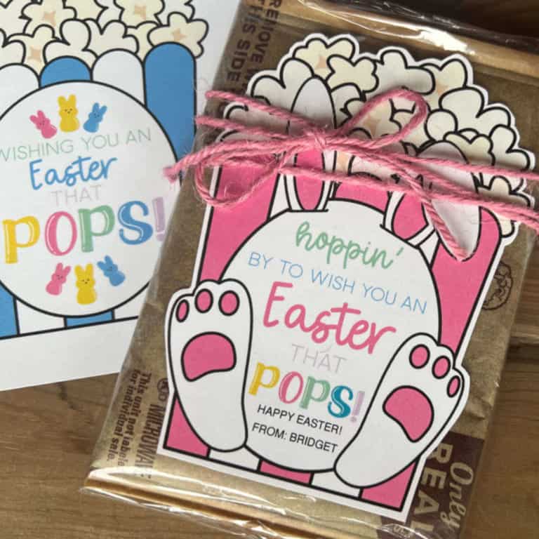 Easter themed popcorn tag tied to a bag of microwave popcorn with pink twine.