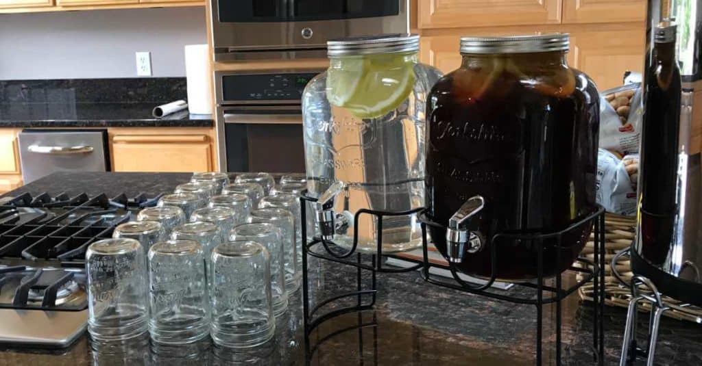 Water and Iced Tea in drink dispensers for a Graduation Party.