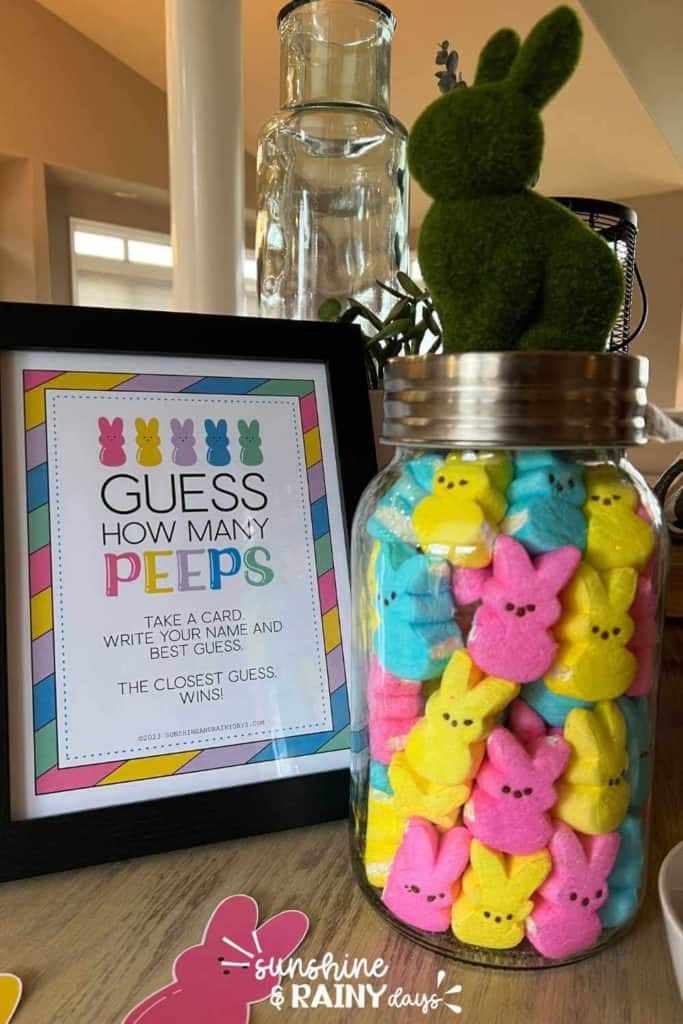 Guess How Many Peeps Are In The Jar sign and jar full of Peeps.