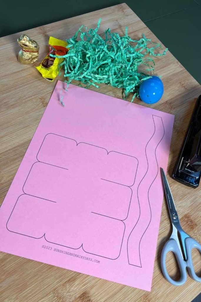 Mini Paper Easter Basket Template printed on pink card stock.
