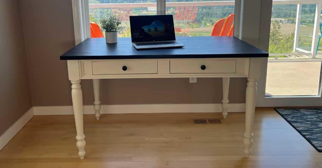 Desk that was made out of a coffee table.