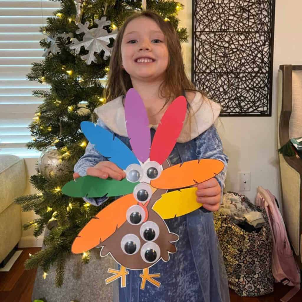 Preschooler who created a turkey with a bunch of googly eyes because they are so fun to stick on!