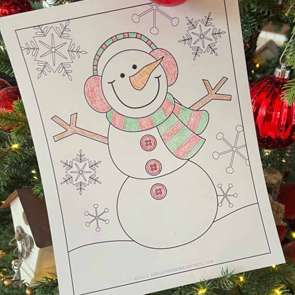 Snowman coloring page you can print at home.