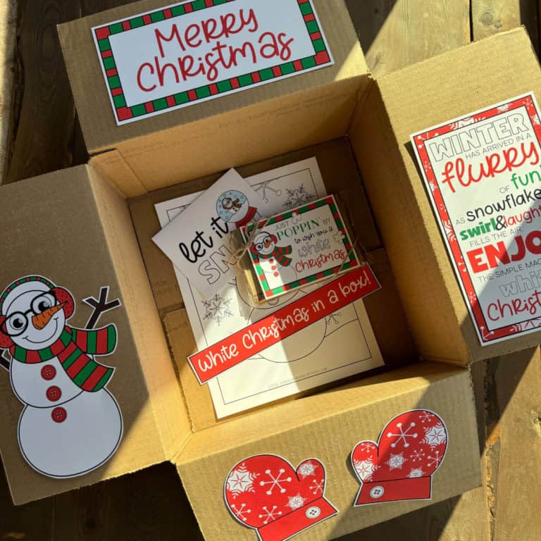 Image of a box with printable shapes on the box flaps in a White Christmas theme.