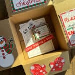 Image of a box decorated with printables in a White Christmas theme.