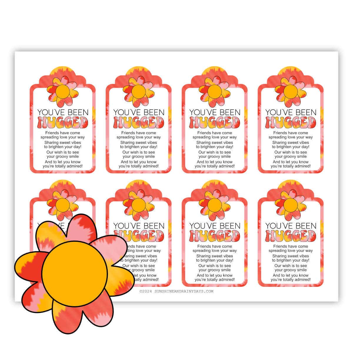 Eight small You've Been Hugged Tags with a groovy theme on one printable page.