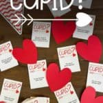 Who Is Most Like Cupid game cards and hearts.