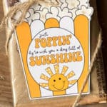 Just Poppin' By To Wish You A Day Full Of Sunshine tag on a bag of microwave popcorn.