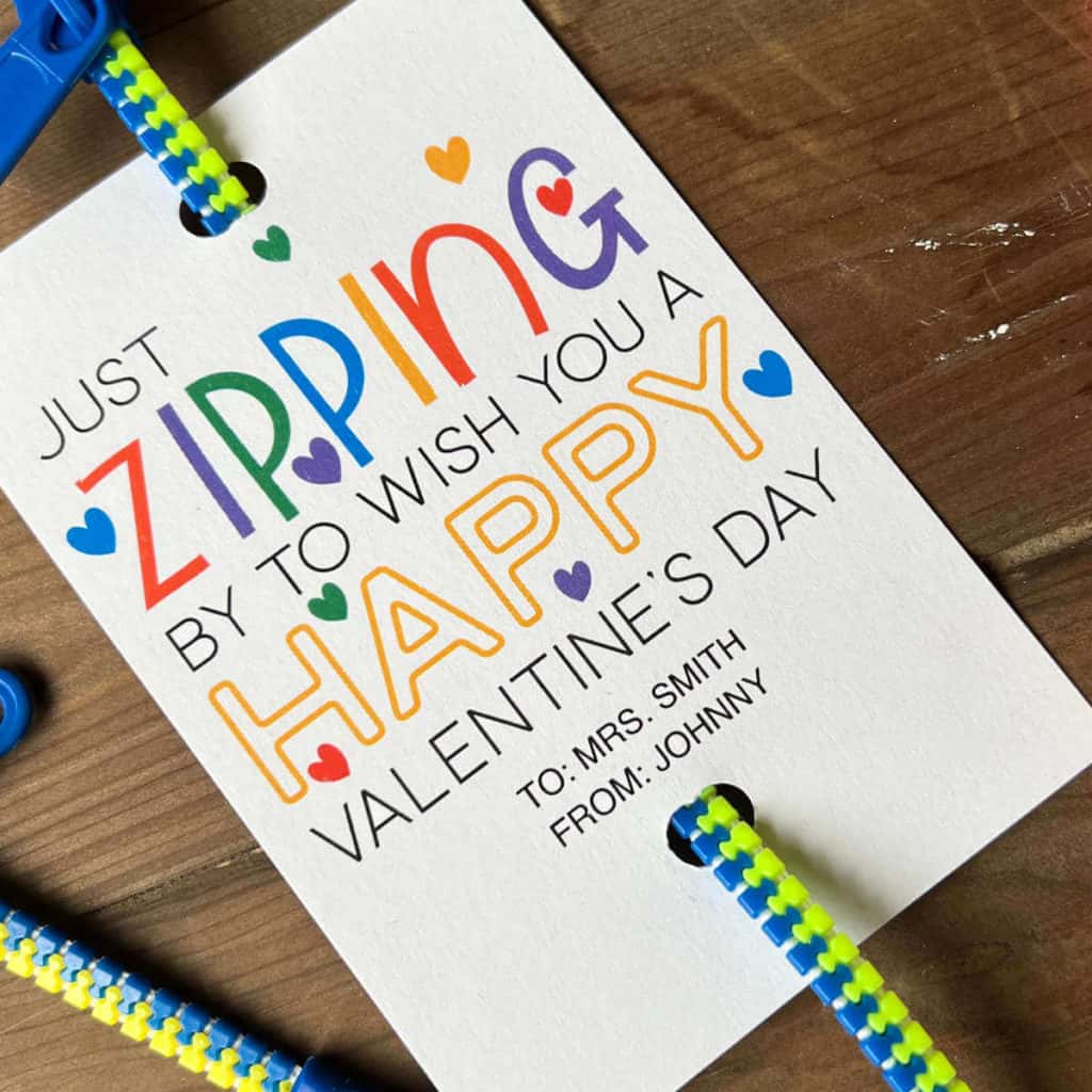 Just zipping by to wish you a Happy Valentine's Day Valentine with a zipper bracelet attached.