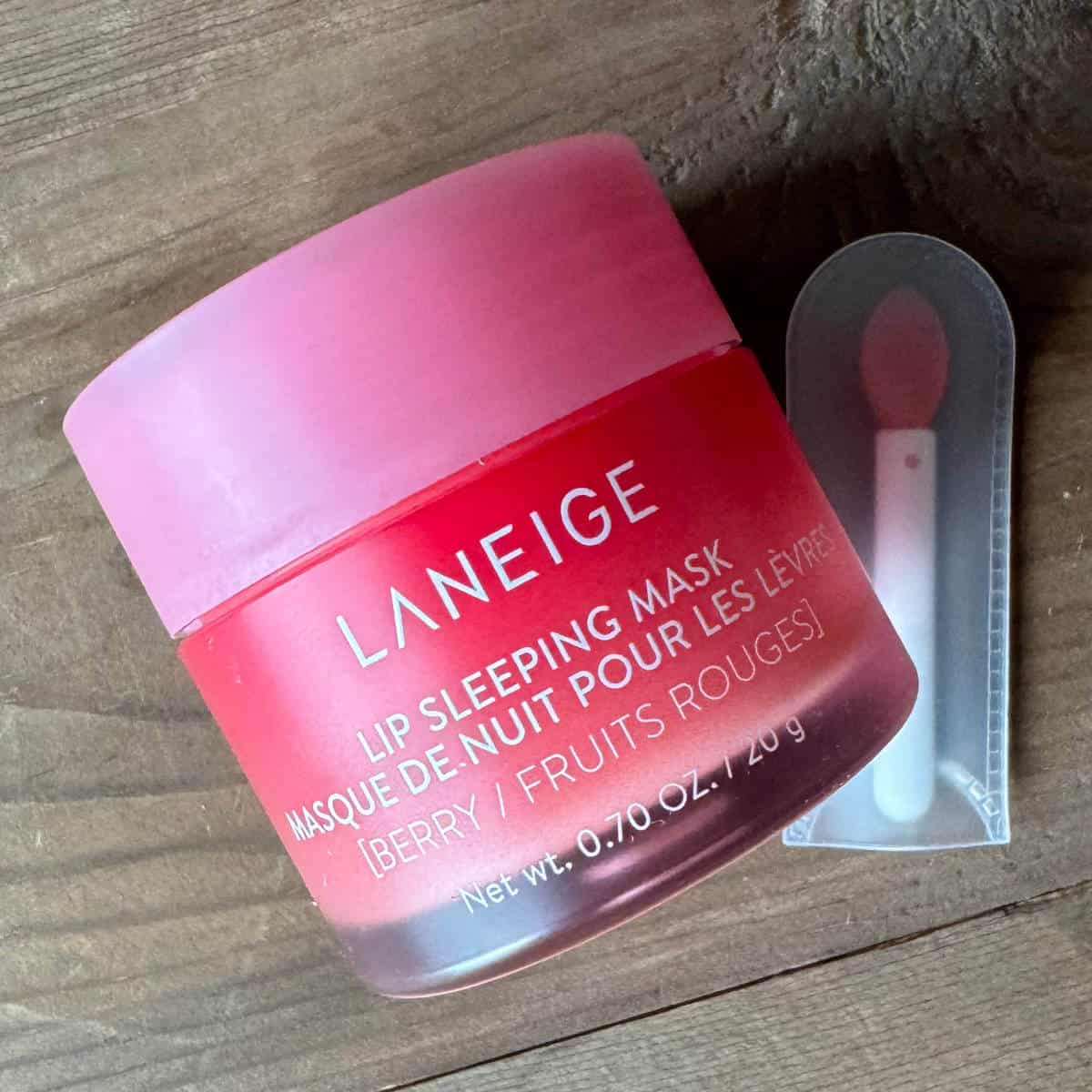 Laneige Lip Sleeping Mask with an applicator next to it.