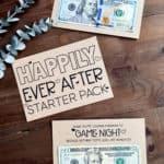Image of three printable pages that say Happily Ever After Starter Pack with money attached to two pages and a fake plant nearby.