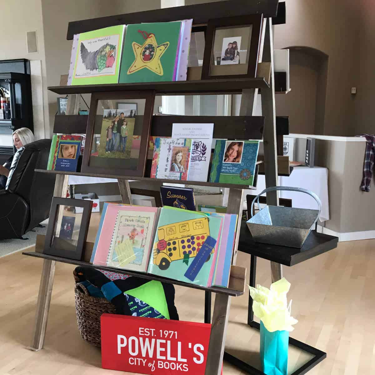 Image of a display used to showcase photos, scrapbooks, and memorabilia for a graduation part.
