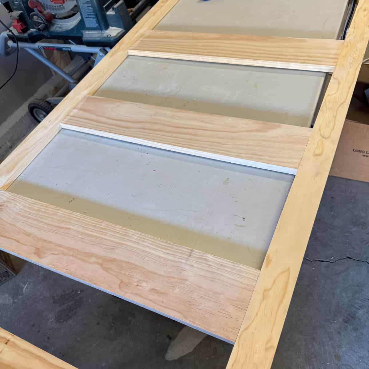 Image of a wood frame with crossboards.