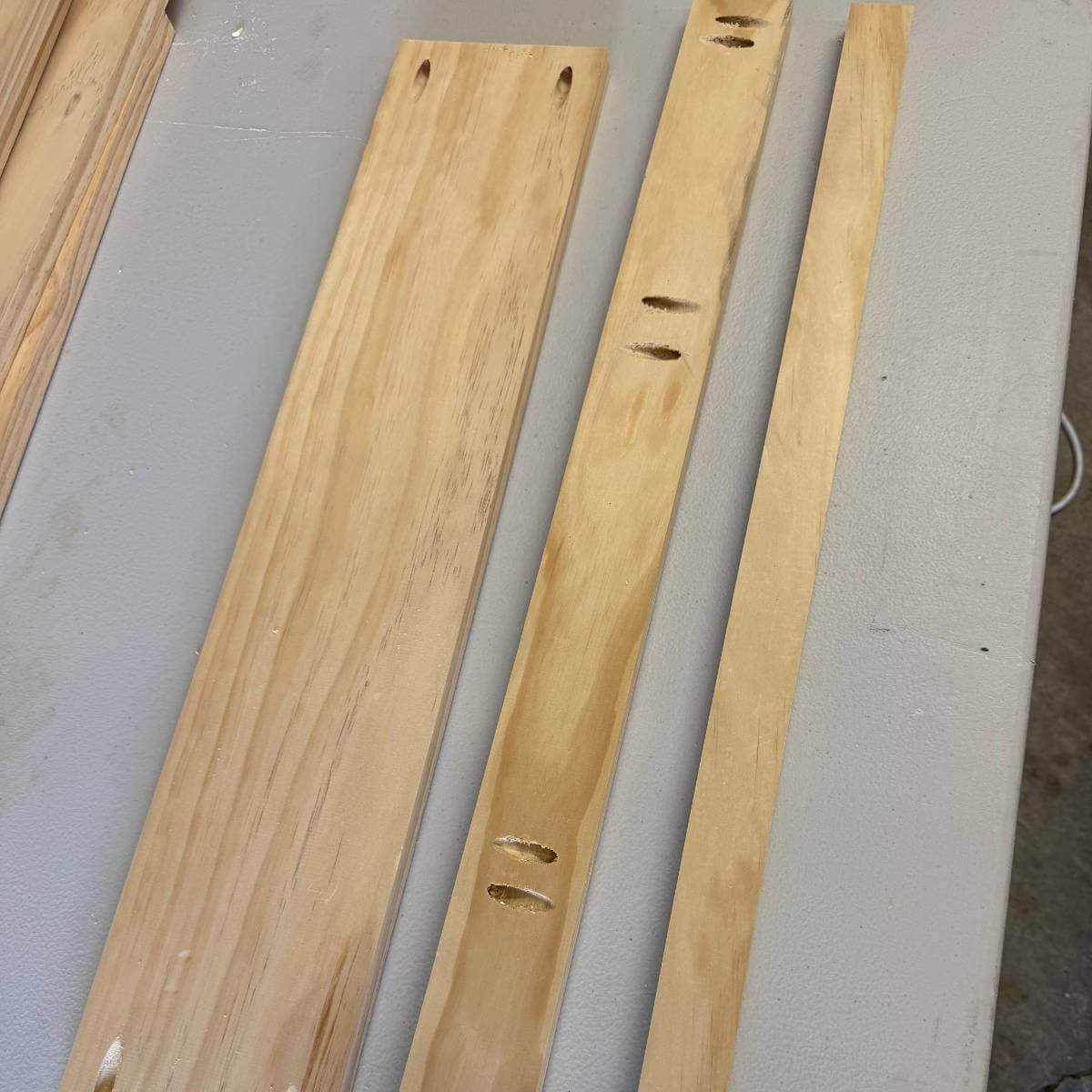 Image of wood with pocket holes drilled in the pieces.